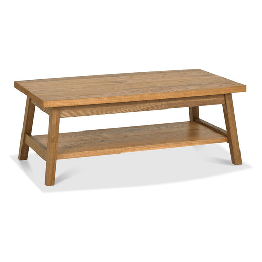 The Camden Coffee Table features a rectangular shape, angled legs, and a lower shelf for storage. With mid-century styling and a natural wood finish, it’s the perfect match for the Camden dining collection.