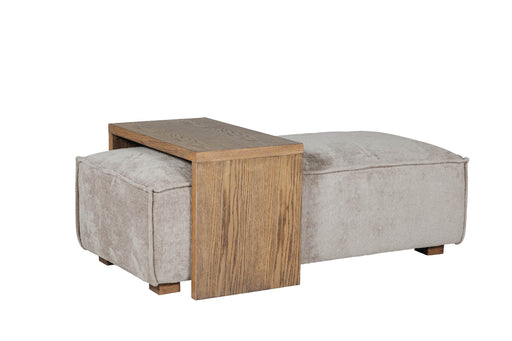 A beige upholstered ottoman and coffee table with a wooden frame, positioned against a white background.