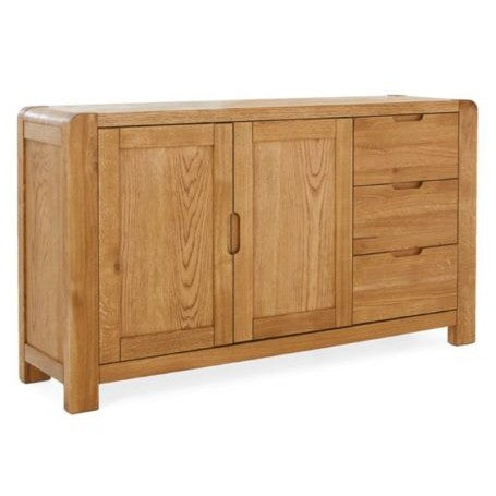 The Edson Large Sideboard features a light oak finish, rounded corners, two left cabinet doors, three right drawers, and is crafted from premium oak veneers for a modern style.