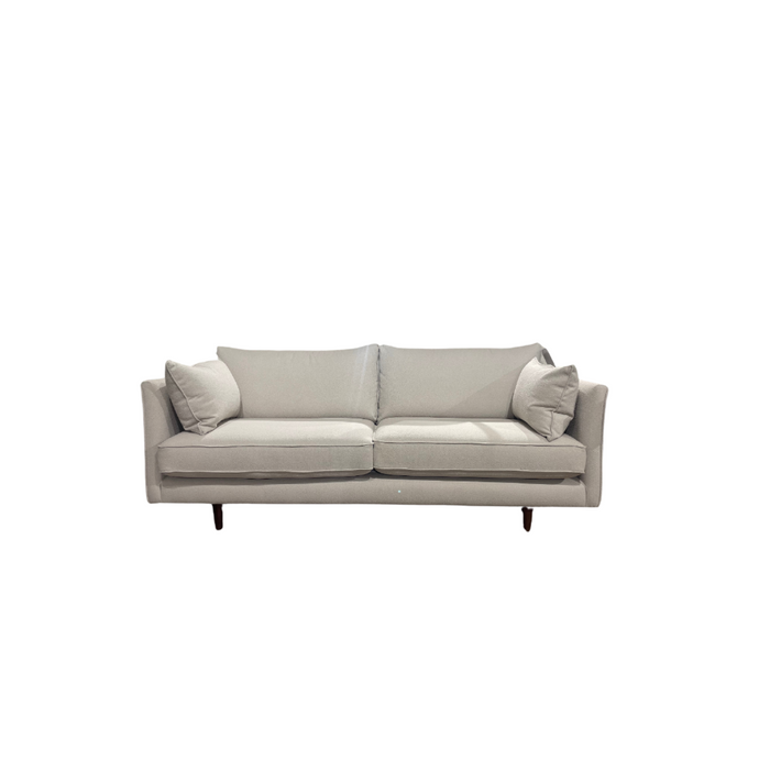 The Hugo sofa is a modern light gray contemporary piece featuring two seat cushions, two large back cushions, and two matching throw pillows made from durable aquaclean fabric, shown against a plain white background.