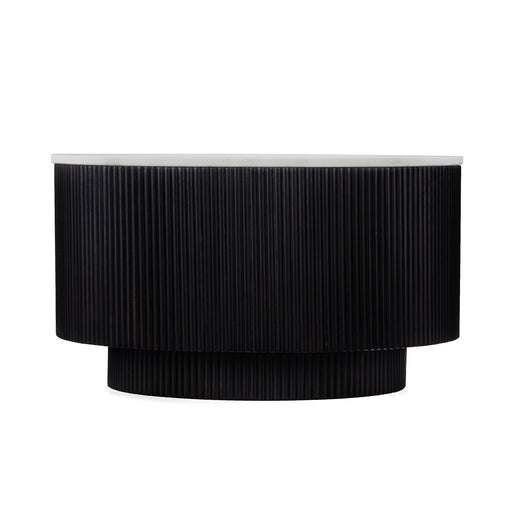 Product image of a round or oval black coffee table with a dramatic fluted texture.