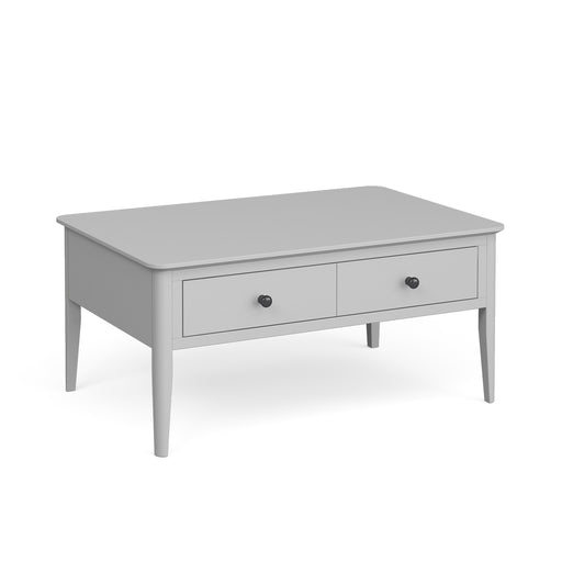 The Stowe Coffee Table, in light gray, measures 95cm x 44cm x 63cm and features two front drawers with black round knobs and four tapered legs, displayed against a plain white background.