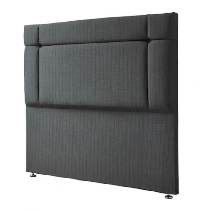 The Oberon headboard features a modern, minimalist rectangular design in dark grey with subtle horizontal and vertical stitched lines, cushioned for comfort and supported by two small metal legs. Choose from versatile colours to match any style.