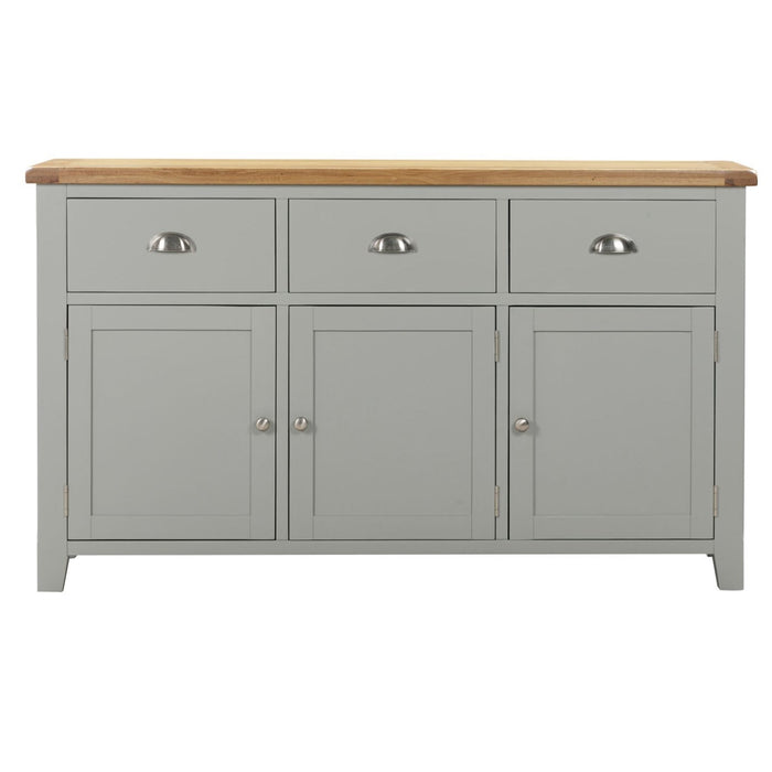 The Capri large sideboard by vendor-unknown features a light grey finish with oak tops, three drawers with chrome cup handles, and three cabinet doors with round knobs.