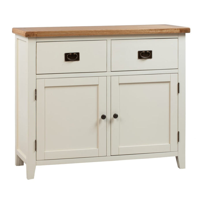 The Skellig Small Sideboard by vendor-unknown features a cream and oak finish with two metal-handled drawers, two lower doors with round knobs, and a durable natural wood top.