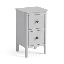 The Stowe bedside by vendor-unknown is a small, light gray wooden nightstand with a sturdy finish, two drawers with black knobs, and four tapered legs—ideal for complementing your modern grey bedroom furniture set.