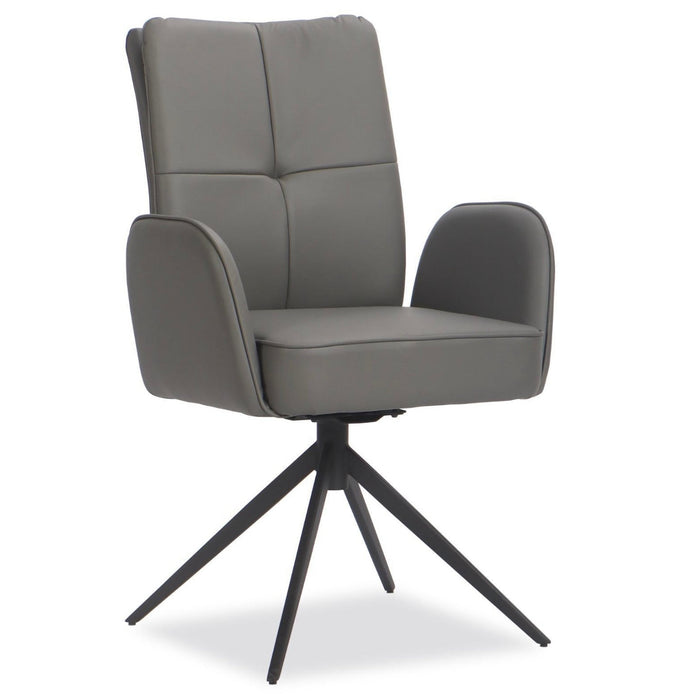 The Thora chair is a modern piece in grey leatherette with padded seat, back, and armrests. It boasts a smooth swivel design and stands on four angled black steel legs.
