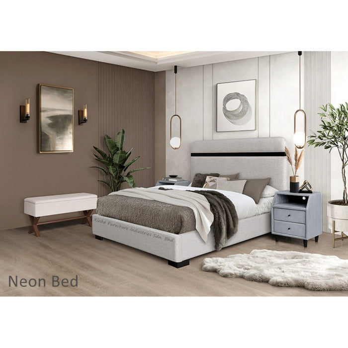Modern bedroom featuring the Neon Bedframe in stone-colored fabric with a high headboard, bedside table, bench, potted plant, wall art, and pendant lights. Neutral tones and a fluffy white rug add coziness and style.