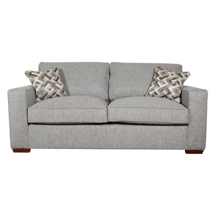 The Chicago sofa by vendor-unknown features light gray upholstery, two seat and back cushions, two geometric throw pillows, and wooden feet—ideal for a stylish modern living room.