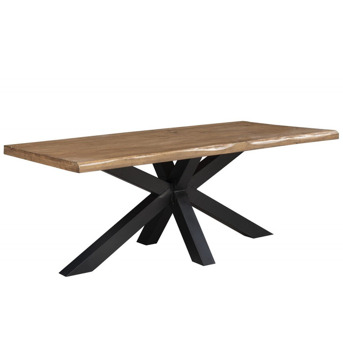 The Richmond Table by vendor-unknown is a rectangular solid oak dining table with a natural finish, featuring a thick top and a modern black metal base with angled legs intersecting at the center.