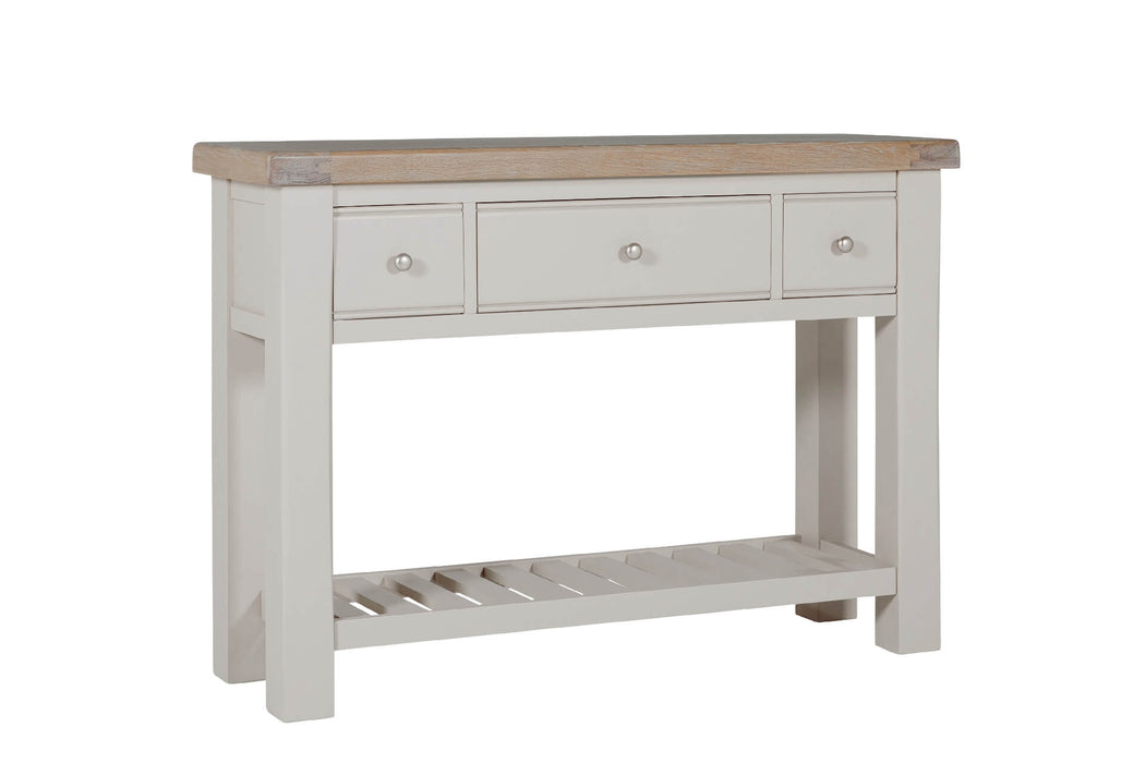 The Doune Console Table features a natural wood top, light gray base, three drawers with round knobs, and a slatted lower shelf for extra storage in a modern, simple design.