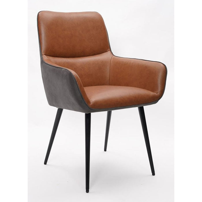 Contemporary dining or accent armchair upholstered in two-tone material, featuring a brown or cognac faux leather interior and a dark gray or black exterior.