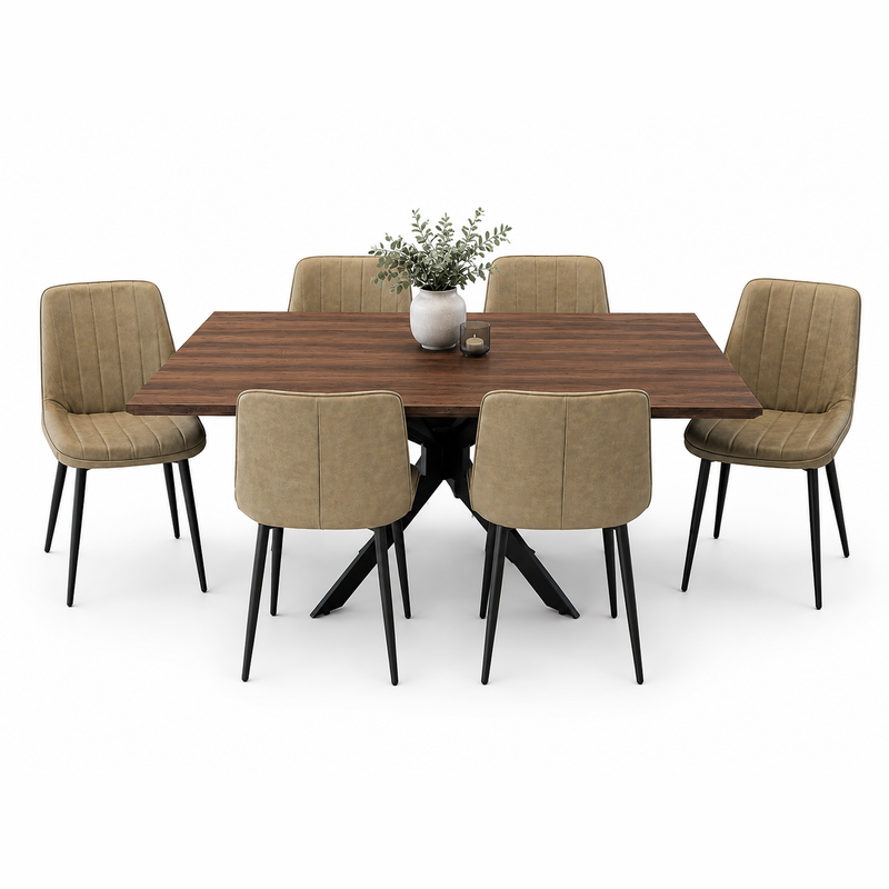 The Elson Dark Table + 6 Lilly Chairs set features a rectangular wooden top with black X legs and six beige upholstered chairs, accented by a white vase with green foliage and a small candle on a plain white background.
