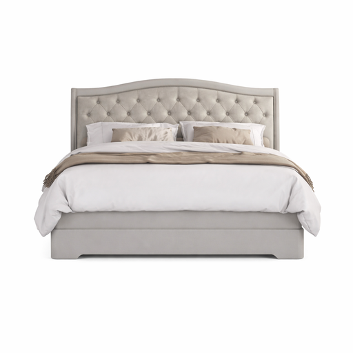 A neatly made bed with a light gray fabric headboard, white bedding, two pillows, and a throw blanket is styled on the Mabel Bedframe and viewed from the front against a white background.