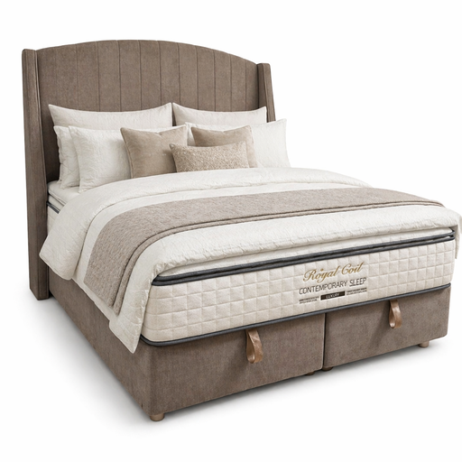 A neatly made Newbury Storage Bedframe in dark beige fabric with a brown upholstered headboard and base, white and beige bedding, multiple pillows, a Regal Cast Contemporary Sleep mattress, and two pull-out drawers.