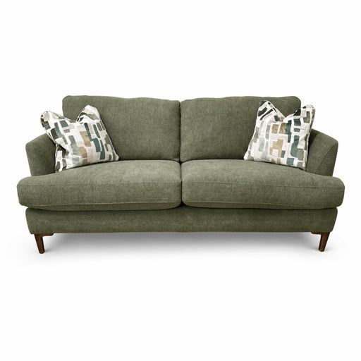 Part of the Joni Range, this contemporary green sofa features two seat and back cushions, wooden legs, plus two decorative pillows with an abstract geometric pattern in neutral tones—perfect for modern homes.