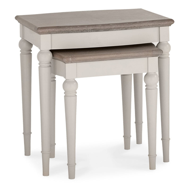 Two-piece nesting tables wood gray painted traditional style.