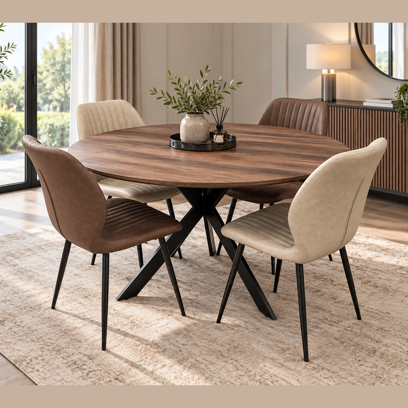 An Elson Dark Round Table + 4 Lyra Chairs set featuring a round table with black X legs and four upholstered chairs in alternating tan and brown colors, arranged on a textured rug.