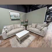 A Berkley 3+2 - Special Offer sofa suite in stone fabric, featuring a three-seater and two-seater arranged with a rectangular coffee table on a rug.