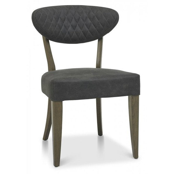The Ellipse Fumed Oak Upholstered Chair features a quilted back, ideal for complementing industrial-style interiors or a rustic oak dining table.
