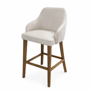 The Como Counter Stool is a modern stool with a light beige upholstered seat and backrest, curved armrests, and wooden legs with a footrest, shown against a white background.