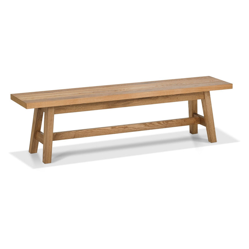 The Camden Bench features a simple, rectangular wooden seat with angled legs and a horizontal support beam. Its natural wood finish coordinates perfectly with the Camden dining collection.