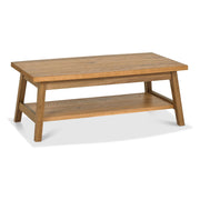 The Camden Coffee Table features a rectangular shape, angled legs, and a lower shelf for storage. With mid-century styling and a natural wood finish, it’s the perfect match for the Camden dining collection.