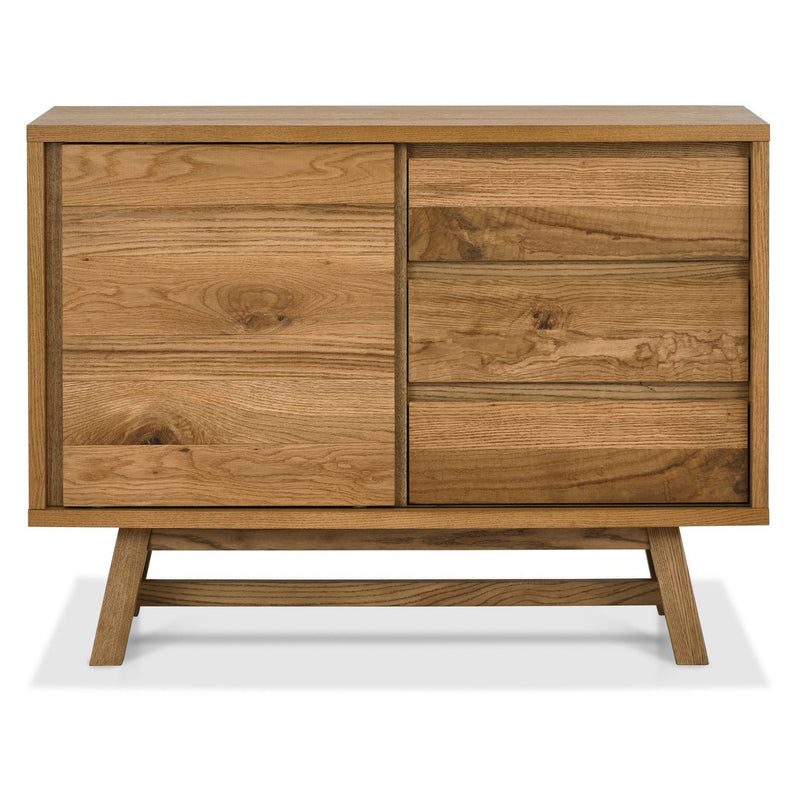 The Camden Small Sideboard features a natural wood finish, one large left cabinet door, three right-side drawers, and angled legs—pairing perfectly with oak table tops from the Camden dining collection.