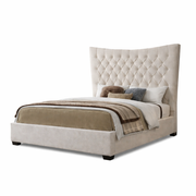 The Montreal Bedframe, featuring beige linen and a high tufted headboard, is neatly styled with neutral bedding, pillows, and a folded blanket at the foot, set against a crisp white background.