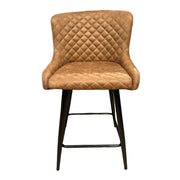 The Diamond Counter Stool features brown PU leather with diamond-patterned quilting, a curved backrest, and black metal legs—ideal as a stylish seating option for your kitchen island.
