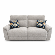 The Barrington Electric Recliner, in light grey durable upholstery, features two seat cushions, supportive back cushioning, and comes with two dark blue floral throw pillows. Shown against a white background.