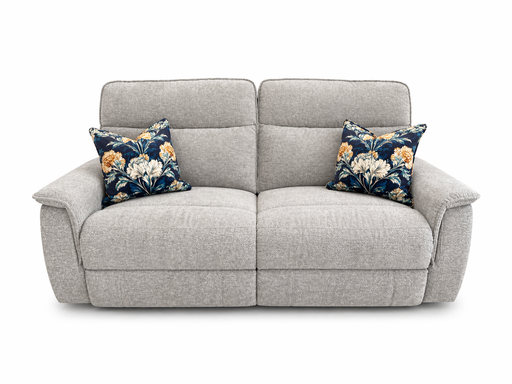 The Barrington Electric Recliner, in light grey durable upholstery, features two seat cushions, supportive back cushioning, and comes with two dark blue floral throw pillows. Shown against a white background.