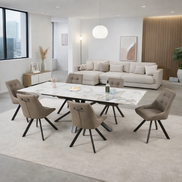 A modern open-concept living and dining area featuring the Sorrento Dining Table with 6 Pedro Chairs, a beige sectional sofa, neutral decor, large windows, and a city view in the background.