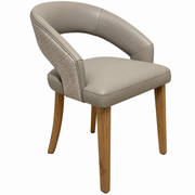 Willow Dining Chair with a curved backrest, gray upholstery on the seat and inner back, textured fabric on the outer back, and four wooden legs.