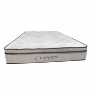A gray and white Clifden Mattress with pocket springs, a quilted top, and "Clifden" embroidered on the side, shown from the foot end.