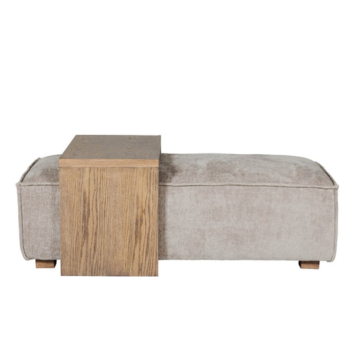 The Bodhi Ottoman + Coffee Table features a rectangular beige ottoman with soft fabric and an attached vertical wooden side table for a modern modular look, displayed against a white background.
