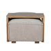 The Bodhi Ottoman + Coffee Table features a beige upholstered modular ottoman with a wooden tray-style coffee table that fits neatly and securely on top.