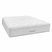 The Kenmare Mattress is a white, rectangular pocket spring mattress with a quilted, tufted surface and "Kenmare" embroidered on the side. Its thick profile features horizontal stitching and provides edge-to-edge support for comfort.