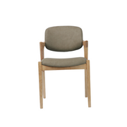 The Mila Dining Chair showcases a modern design with a solid wood frame and light wood legs. It features a cushioned seat and backrest upholstered in olive green fabric, presented against a plain white background. Blending style and comfort, the Mila Dining Chair is an ideal choice for contemporary dining spaces.