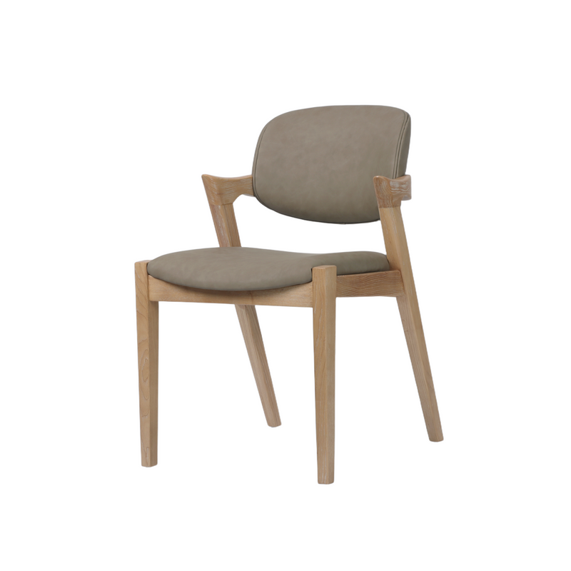 The Mila Dining Chair features a contemporary solid wood design with angled legs, curved armrests, and plush padding on both the seat and backrest, all upholstered in light brown fabric—combining modern style and comfort to create an eye-catching addition to any dining space.