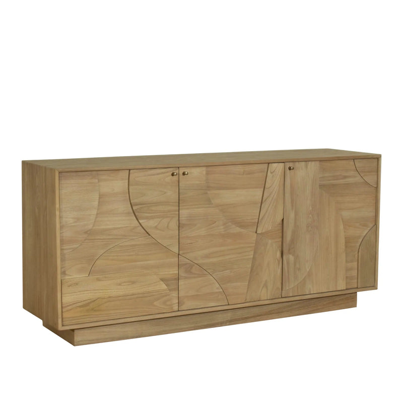 The Dakota 3 Door Sideboard – Oak is a modern sideboard in light natural wood with three cabinet doors, featuring subtle curved and geometric carved patterns, set on a rectangular base against a white background.