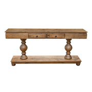 The Leeds Console Table offers timeless rustic style with two small drawers, decorative turned legs, and a lower shelf, all crafted from natural wood with a smooth finish for added charm.