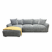 The Izzy Chaise Corner is a modern grey corner sofa with two matching pillows, a left-side chaise lounge, and a folded yellow blanket, shown against a white background.