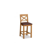 Rustic wooden barstool with natural finish and a comfortable brown cushioned seat.