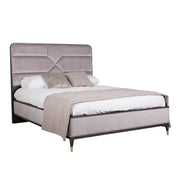 A modern Diletta bedroom range bed with a plush front in a light sand wood color, featuring gold accents and a black headboard.
