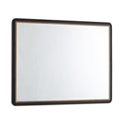 The Diletta Mirror is a rectangular ebony wood mirror with a dark, rounded frame and thin gold inner border, perfect as an elegant dressing table accent. Shown here against a white background.