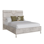 The Diletta Bedframe is a modern queen-size bed with a tall, light gray upholstered headboard, white bedding, green animal-print accent pillows, and elegant ebony wood accents set against a white backdrop.