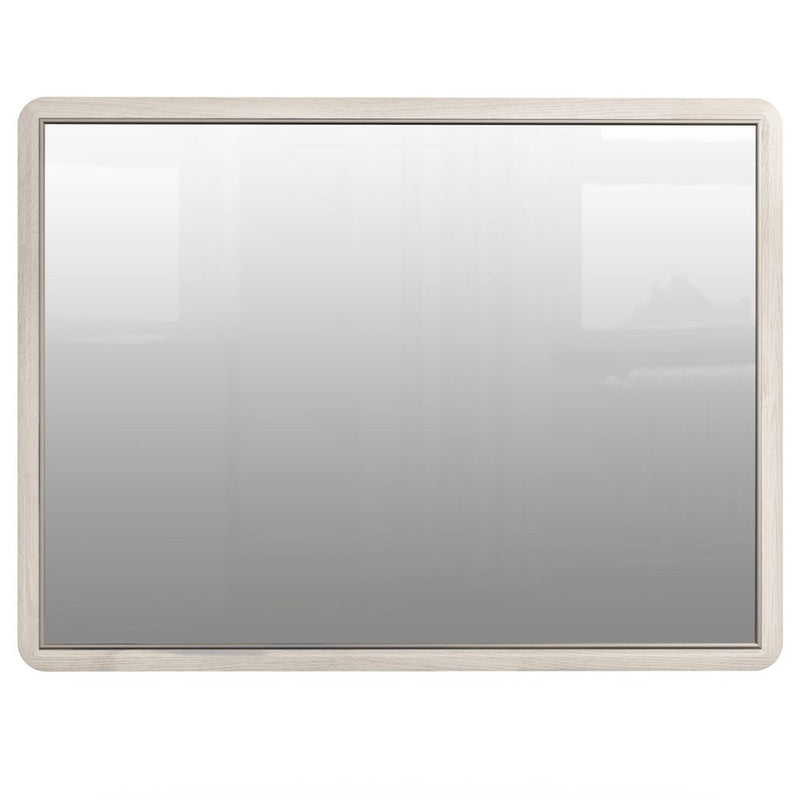 The Diletta Mirror features a rectangular shape with a light wooden frame and white background, reflecting brightness and subtle room details. Ideal as a dressing table mirror, it adds a fresh, modern touch to any bedroom.