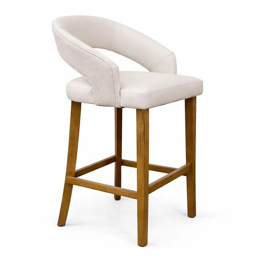 The Willow Counter Stool showcases a curved, upholstered white backrest and seat, supported by light wooden legs with footrests. Displayed at an angle against a white background, this modern stool combines style and comfort.