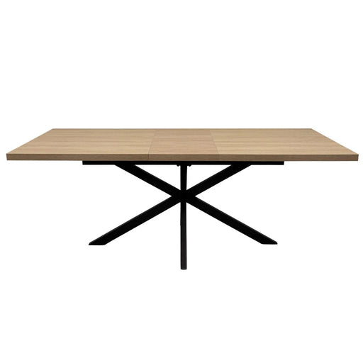 The Dalton 1.6 Extending Table features a rectangular wood-effect top and a black metal X-shaped base in an industrial style, presented against a white background.